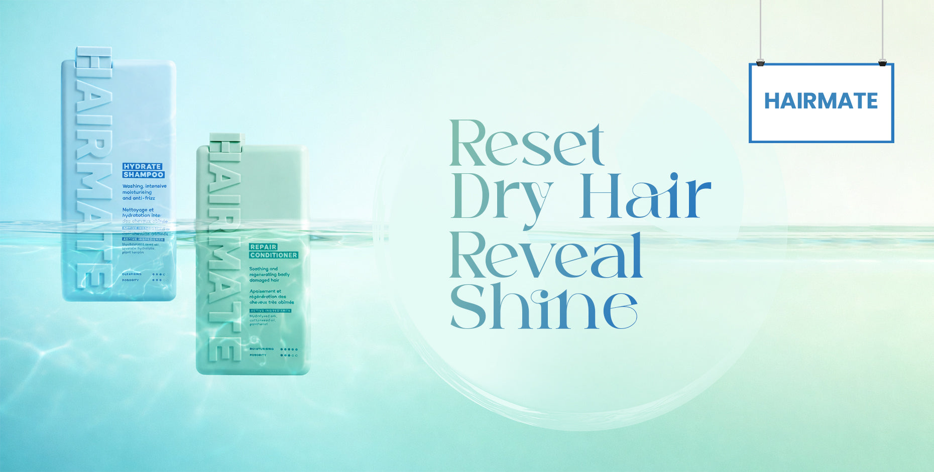 Hairmate shampoo and conditioner bottles in cool blue and green, floating in water with "Reset Dry Hair Reveal Shine" text.
