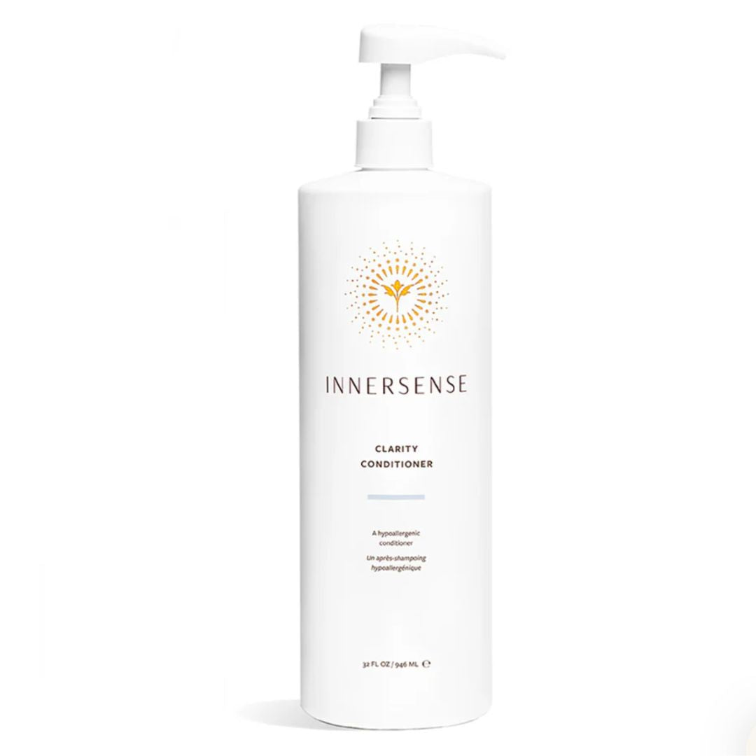 White Innersense Clarity Conditioner pump bottle with orange sunburst logo, 32 fl oz.