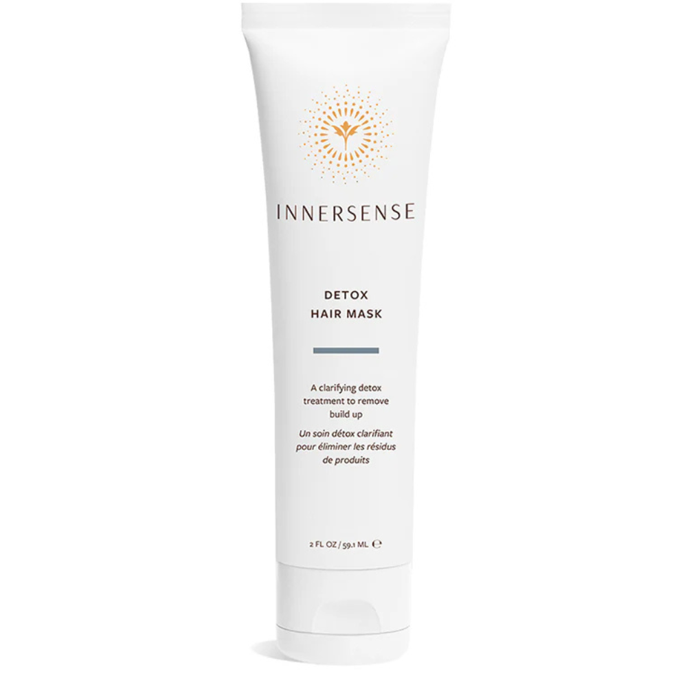 White Innersense Detox Hair Mask tube with orange sunburst logo, 2 fl oz / 59.1 mL.