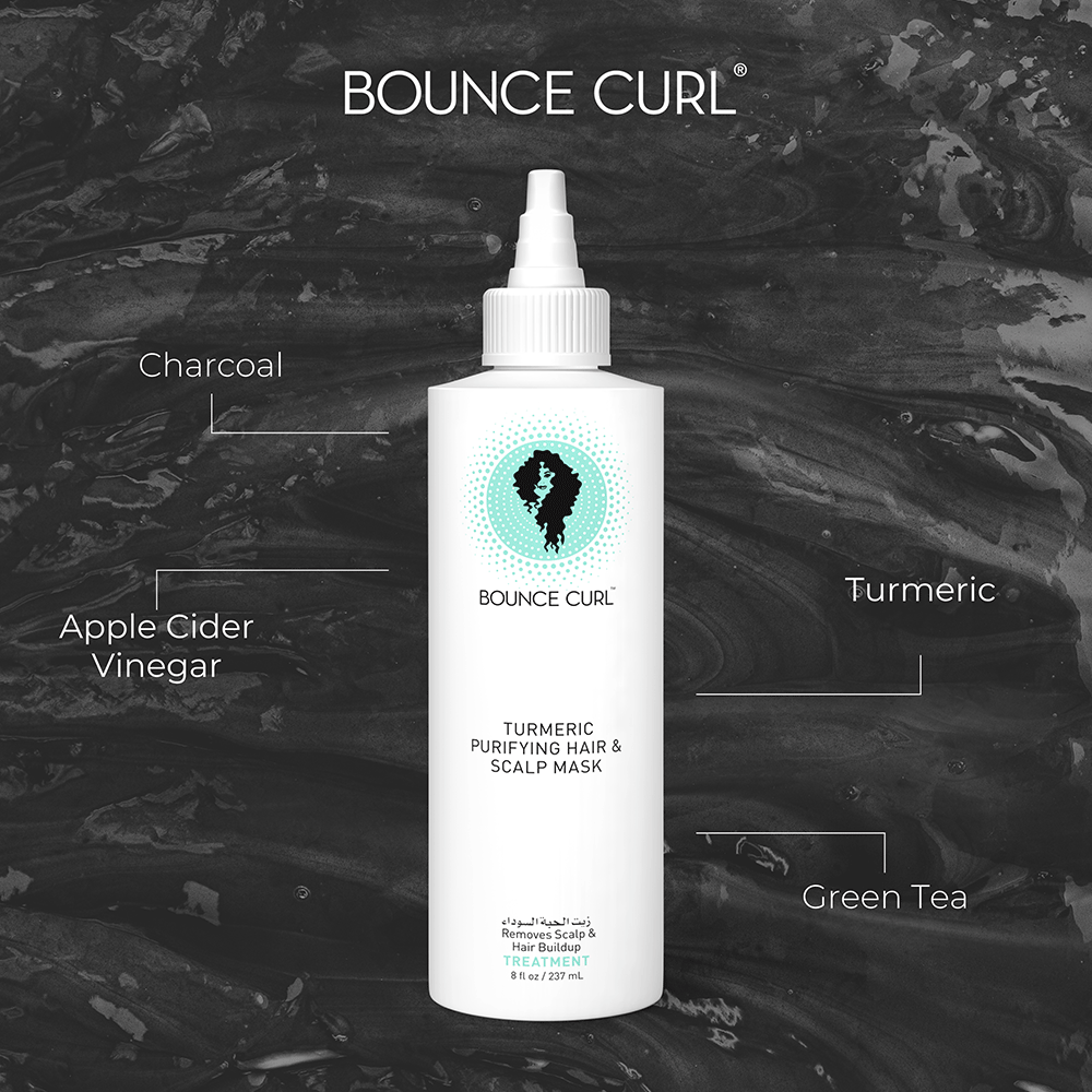 White Bounce Curl Turmeric Purifying Hair & Scalp Mask bottle with a pointed nozzle, 237ml, against a dark marbled background.