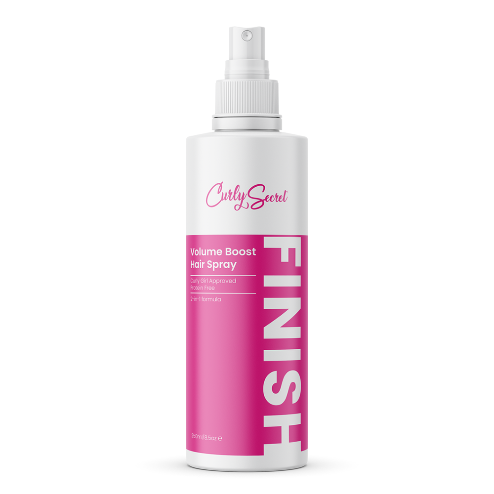 White Curly Secret Volume Boost Hair Spray bottle with a pink "FINISH" label.